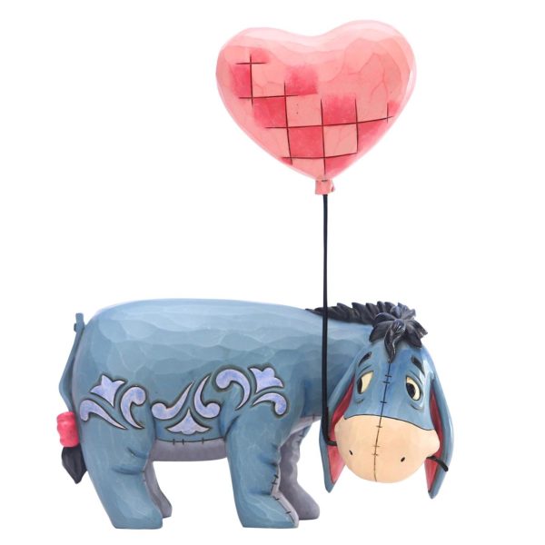 Figurine Bourriquet avec un ballon en forme de cœur