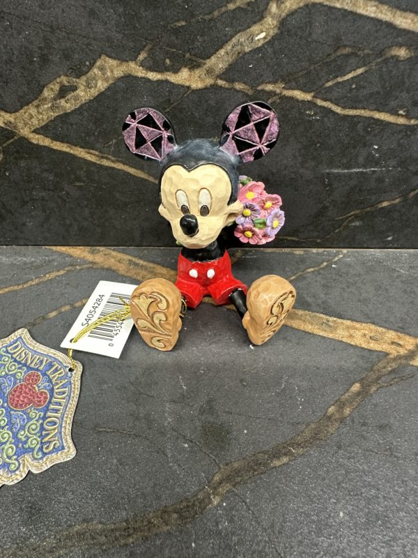 Mini figurine Mickey Mouse avec des fleurs